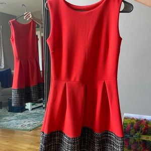 A cute reddish orange formal dress